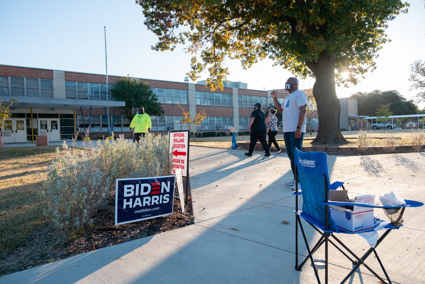 Photos: Metroplex voters brave cold weather at the polls, businesses board windows on Election Day